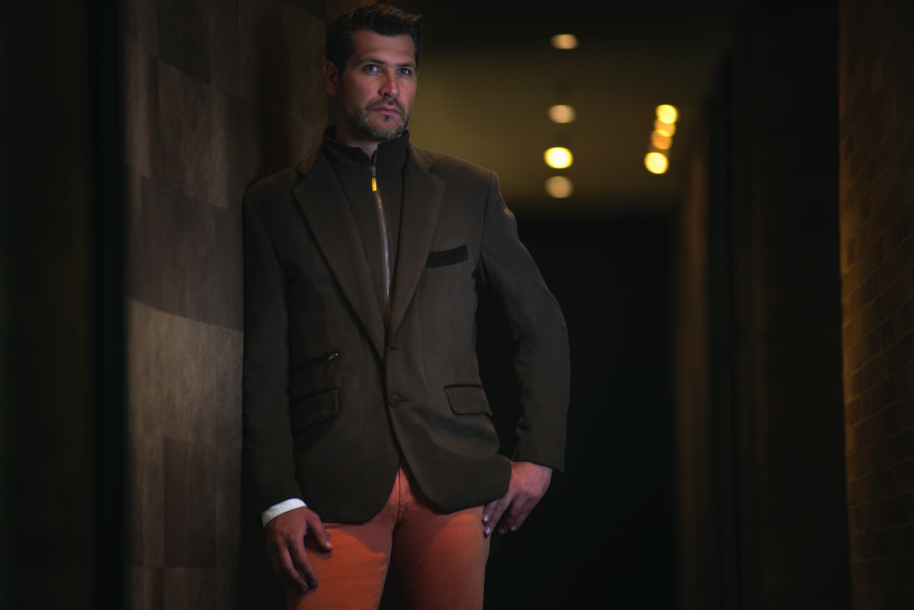 A man in a tailored MC Armor ballistic blazer